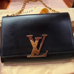 Authentic Gently used Louis Vuitton 
Louise Chain/Clutch evening bag.